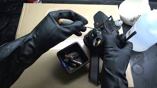 Cleaning out battery corrosion from a Nikon camera with 4 AA batteries