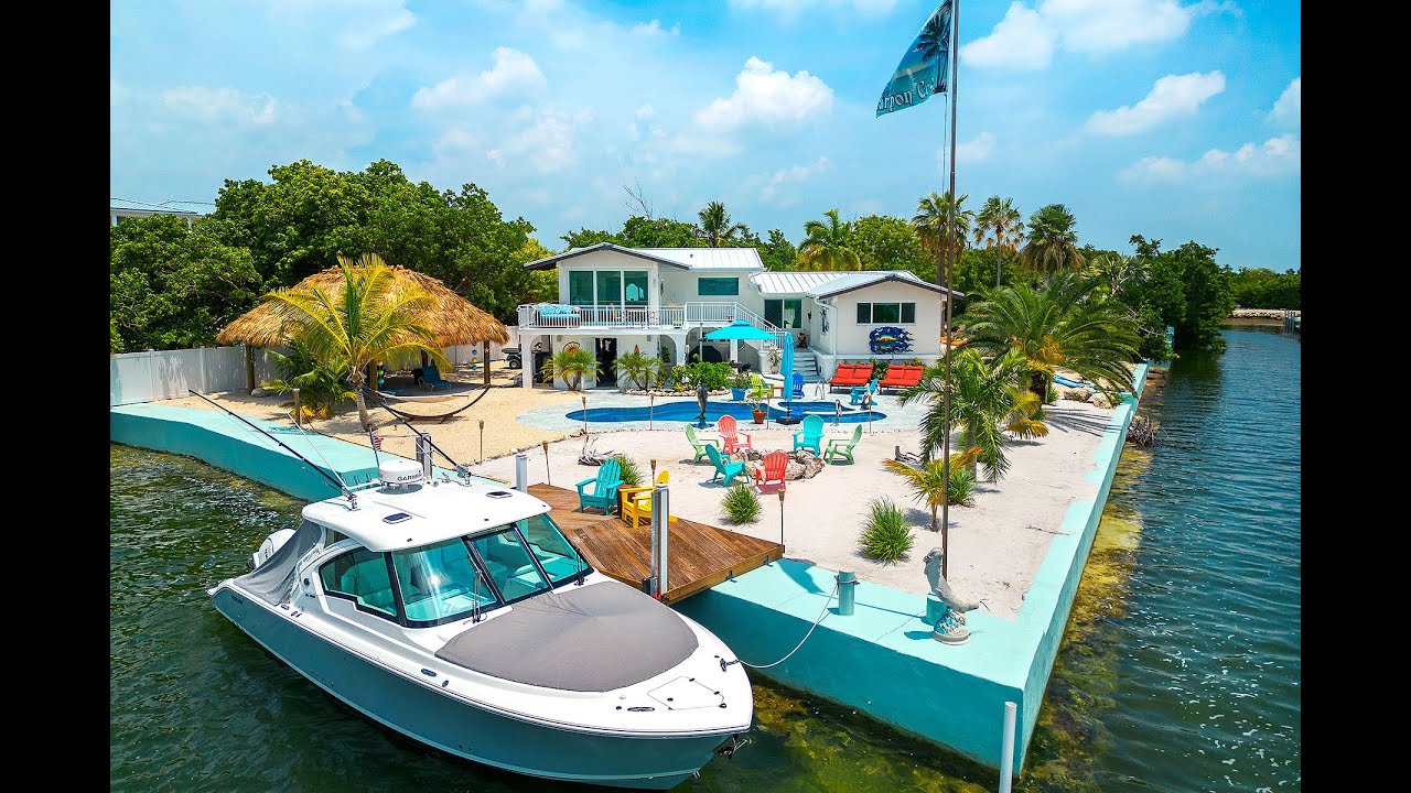 Welcome to 680 Elma Ave, Big Pine Key. Modern Interior,  Sunsets, Exceptional Boating and Privacy!