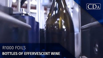 CDA - R1000 Foils - bottles of effervescent wine - Automatic labeller