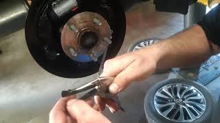 Trick to install parking brake cable on drum brakes