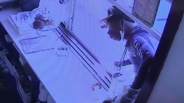 Thief caught on surveillance video emptying tip jar of Miami Beach restaurant