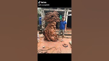 Di lạc vác cành đào đứng dưới gốc cây tùng 9 tiểu đồng gỗ hương việt cao 2m20