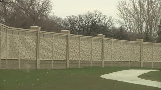 Officials celebrate floodwall completion