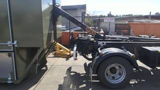 Hook lift Mobile Workshop loading onto truck