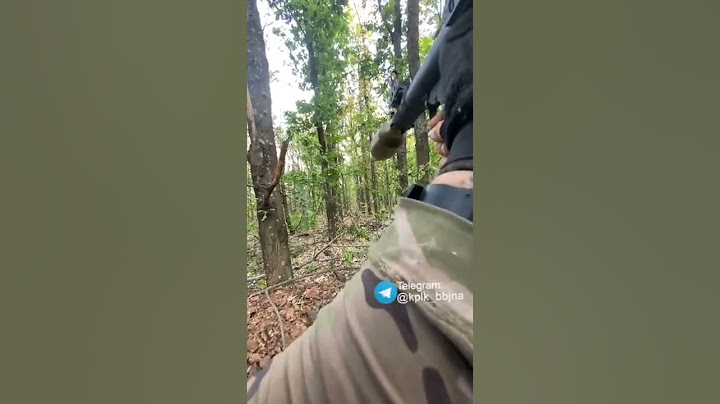 Ukrainian soldier POV hitting target with RPG-7