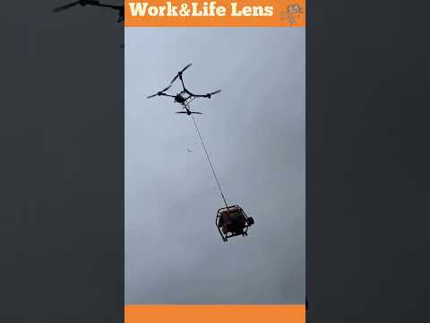 A heavy-lift drone transports a generator to a remote area, offering cost-effective delivery.