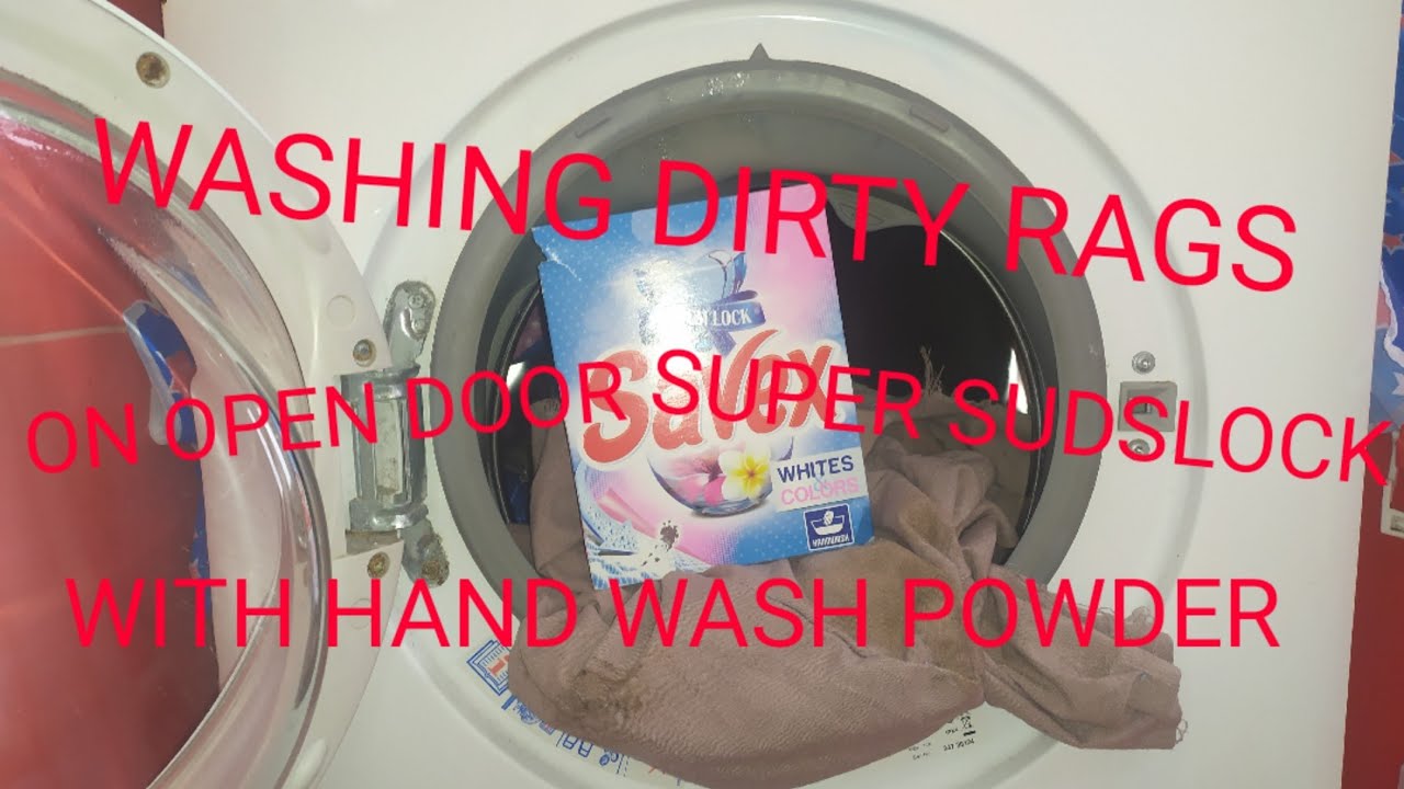Experiment Washing Dirty Rags With Hand Wash Powder On Open Door And