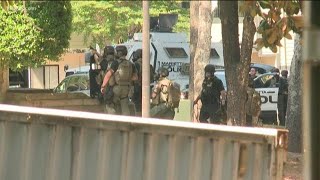 Man who barricaded himself in attic, escaped from scene now in custody