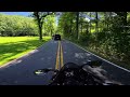 Guy in truck tries to run biker off the road