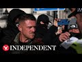 Tommy Robinson leads protesters on march around Chinatown