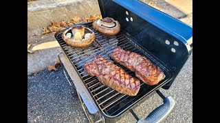 Juicy Strip steak on weber go anywhere charcoal