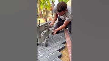 Brick paving installation process using a manual cutter for precise edge fitting