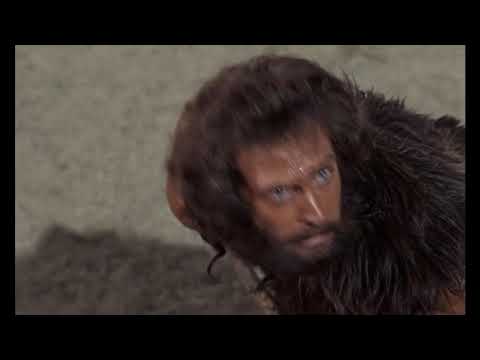 مشهد هجوم الديناصور على رجل الكهف