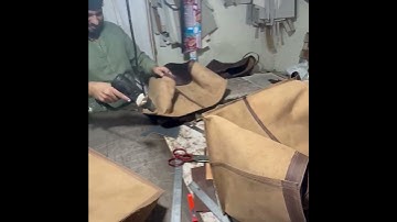 LEATHER LOG CARRIER BAG