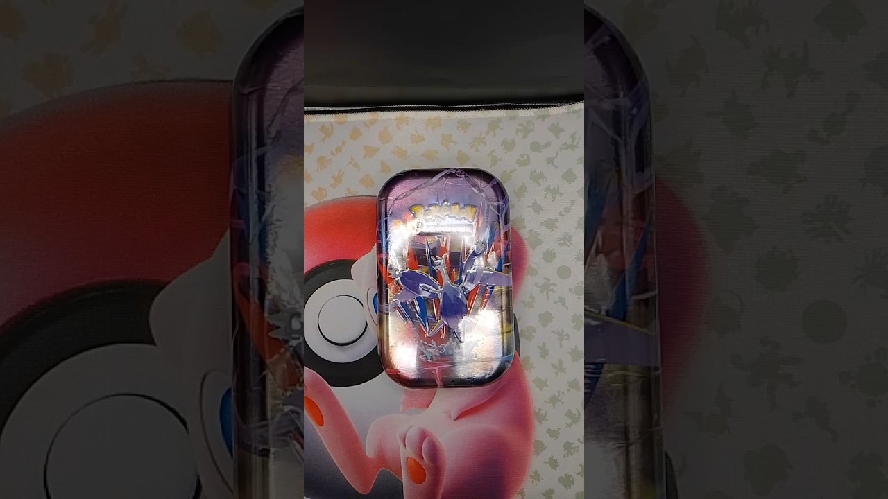 Pokemon Mega Evolutions mega latias mini tin opening up. 