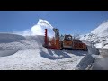 Zaugg Rolba snow blower removes several feet of snow from highway