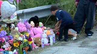 Community holds vigil for two-year-old who died in drainage channel on northwest side.
