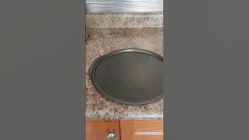 Kitchen Organization Hacks (Unexpected Storage Place for Pizza Pans if you live in North America)