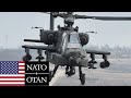 Внимание. Ударные вертолёты AH-64D Apache Longbow проводят стрельбы на полигоне в Германии.