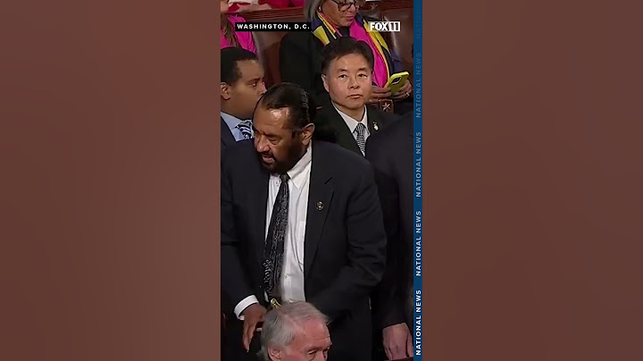 Democratic representative removed from Trump address due to heckling