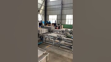 Retort pouch loader and unloader system