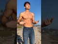 GayVibes Shirtless Fitness Model Dancing By The Beach 