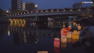 被爆77年目の広島、とうろうが川を彩る