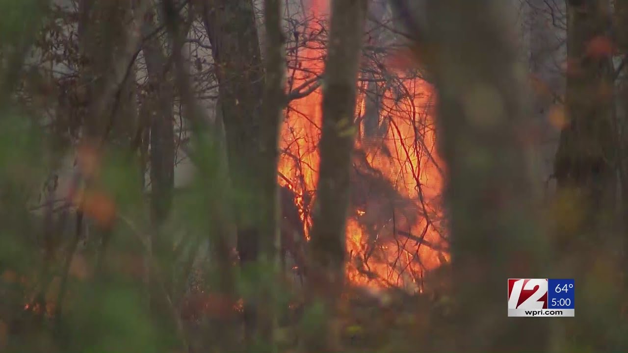 Crews work to contain large brush fire in Cumberland - YouTube