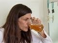 Woman drinks her own piss