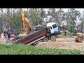 ឡានយីឌុបដឹកដីជាប់ផុង Extreme truck fails - dump trucks 24ton stuck in deep - recovery by bulldozer