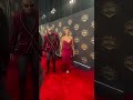 Carmelo Hayes and Kelani Jordan walk the WWE Hall of Fame Red Carpet!