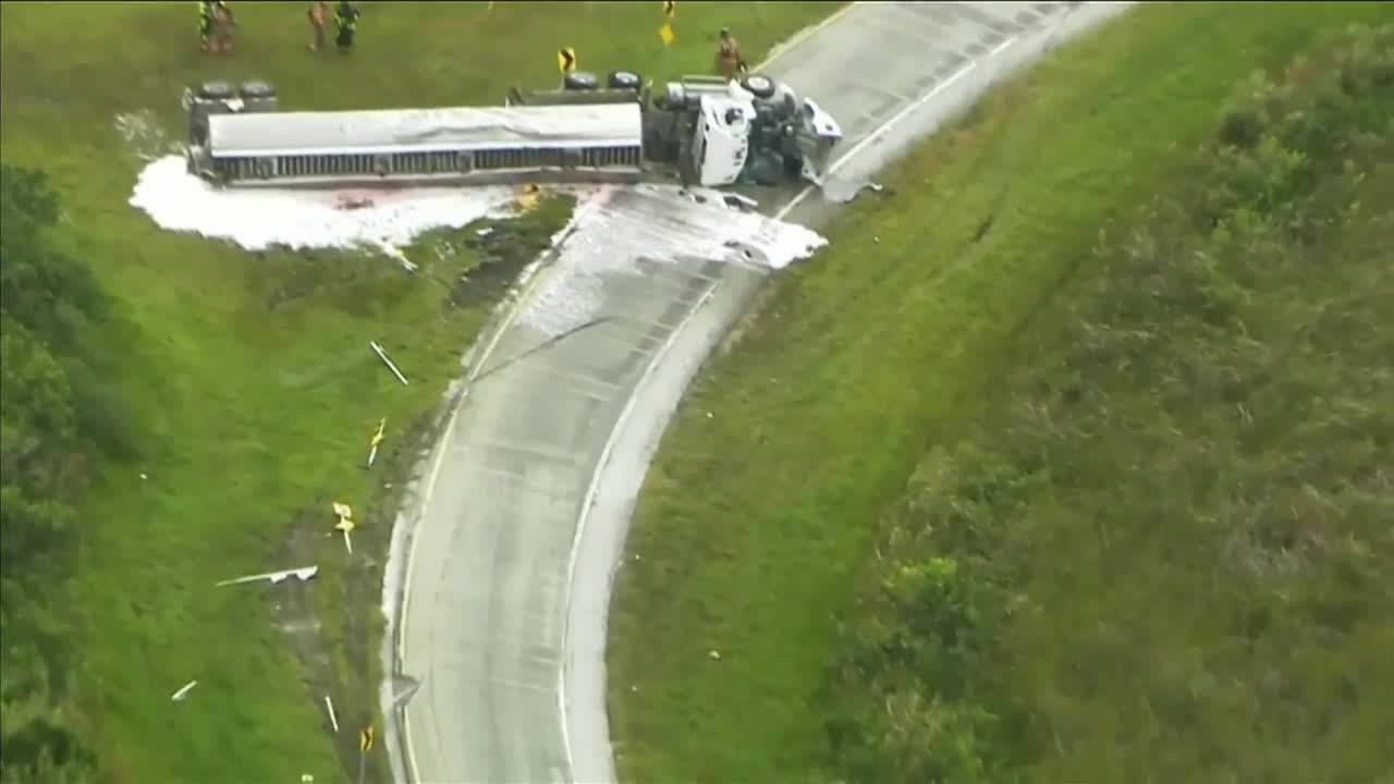 Fuel truck overturns on U.S. 27, spilling gas onto road - YouTube