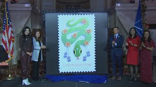 VIDEO | USPS unveils latest Lunar New Year stamp; Year of the Snake