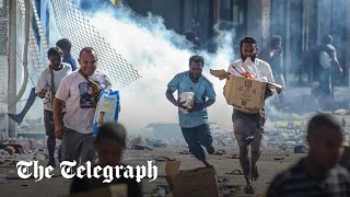 video: Sixteen die in Papua New Guinea riots as police and soldiers go on strike