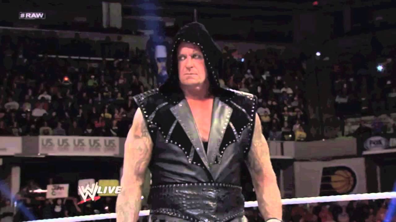 Undertaker Stabs Brock Lesnar with Pen and Chokeslams Through Table 2 ...