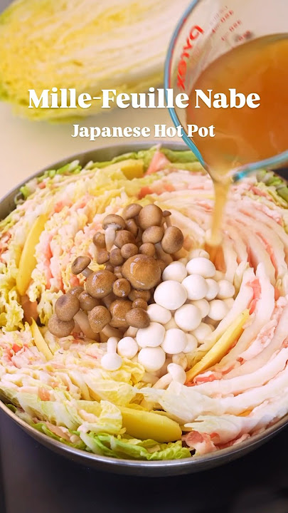 Mille Feuille Nabe is a Japanese hot pot made of layered Napa cabbage and pork slices in dash broth