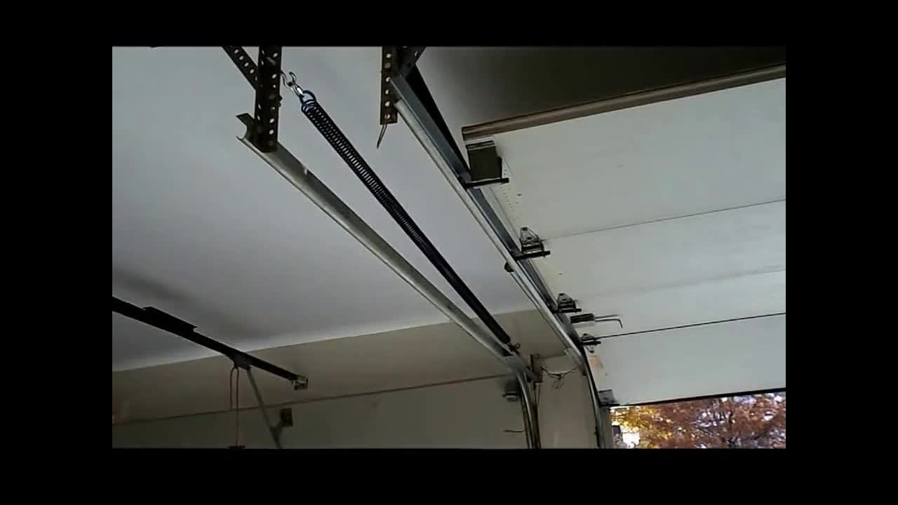 Simple Garage Door Cable Unwound for Large Space