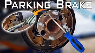 Car still moves with handbrake on/How to adjust Parking pedal brakes /Adjusting brake drum