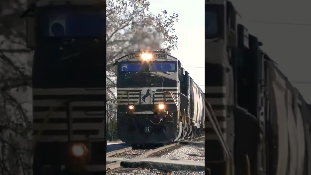 Train BLOWS it's horns through a quiet town