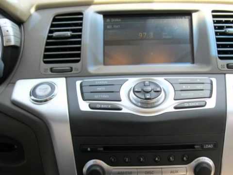 Where is the auxiliary jack in a 2009 nissan murano