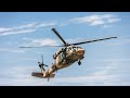 Taliban victory parade with US Black Hawk helicopter and heavy armoured vehicles