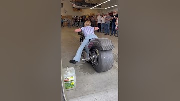 Girl burnout on her drag bike