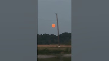 Thumbnail of An orange moon on the 25th anniversary year of Mama’s Gun by Erykah Badu