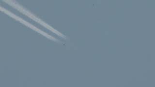 An Almost Invisible Lockheed C-5M Super Galaxy Contrailing Above My House