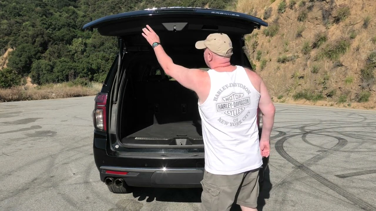 Opening the electric tailgate on a 2023 Chevrolet Suburban : 4K Widescreen.
