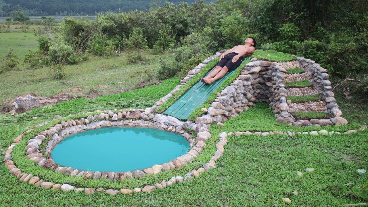 ⁣Unbelievable! A forest man build water slide using only primitive tools and materials