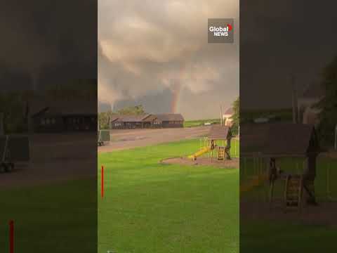 Rare weather phenomenon with rainbow, tornado seen side by side - The
