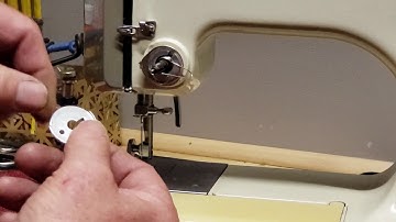 Remove, clean, adjust tension assembly on Kenmore  sewing machine