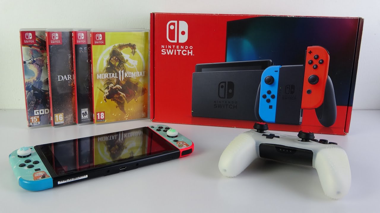 Нинтендо свитч v2. Nintendo Switch Pro 2021. Nintendo Switch анбоксинг. Распаковка Nintendo Switch.