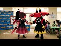 Cherry Cola Cookie Mascot Shaking Hands With Tapu Bulu Mascot
